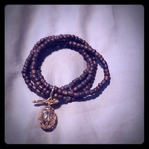 Brown beaded Bracelet with gold charm